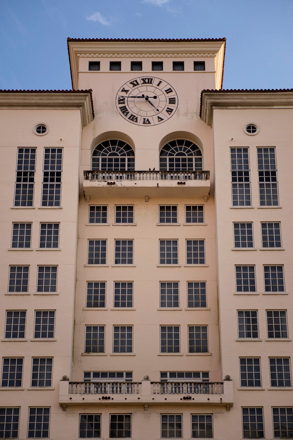 Historic Mediterranean Revival clock tower facade in Coral Gables, Miami